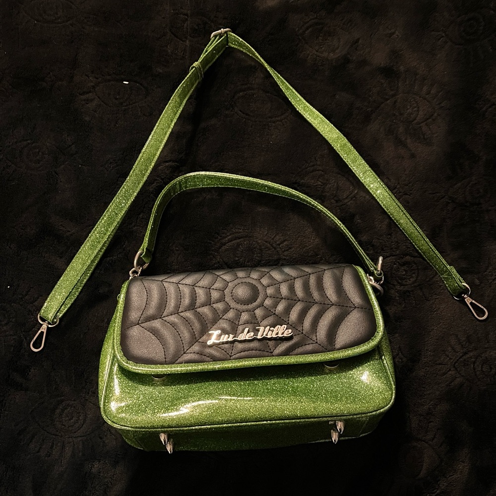 Lux De Ville green sparkly spider web bag